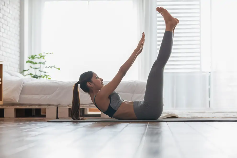 Abdominales con toque de punta de pies