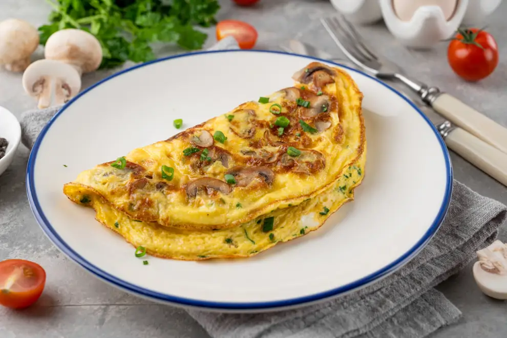 Tortilla de champiñones y albahaca